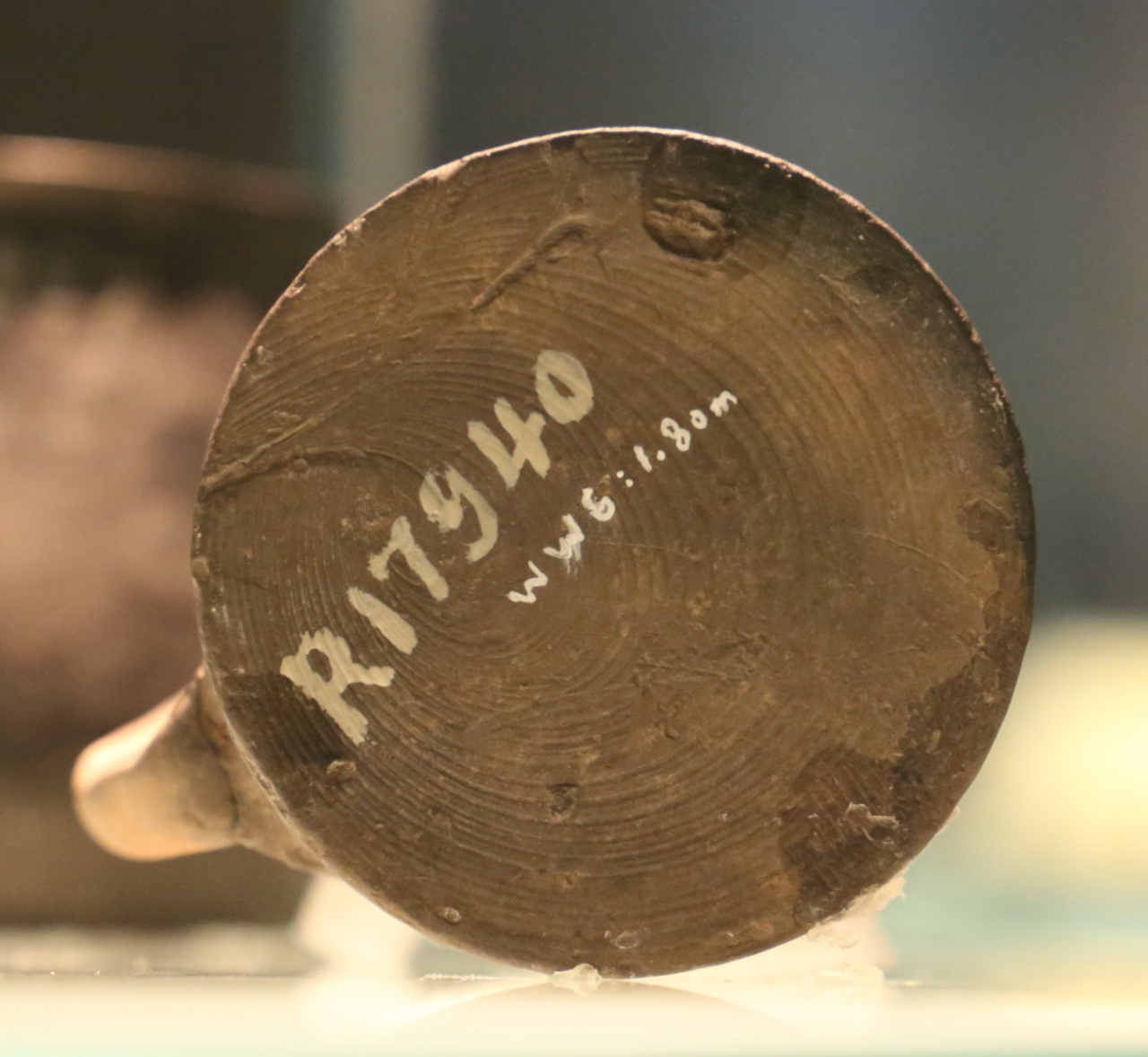 「黑陶帶把杯形器」及其器底製作痕跡